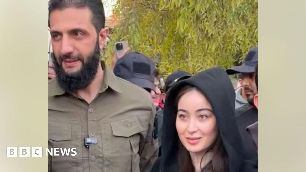 Syrian rebel leader dismisses controversy over photo with woman