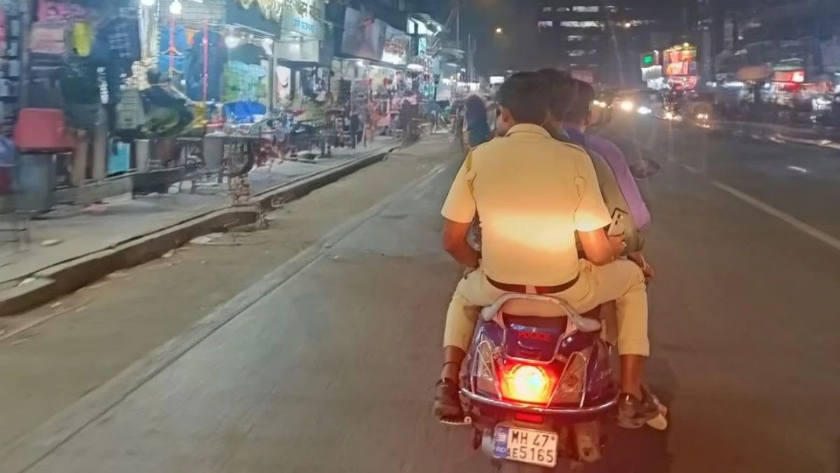 “What do you mean by rules?” : Netizens react sarcastically after Mumbai cop caught riding triple seater with helmetless biker on police-tagged bike