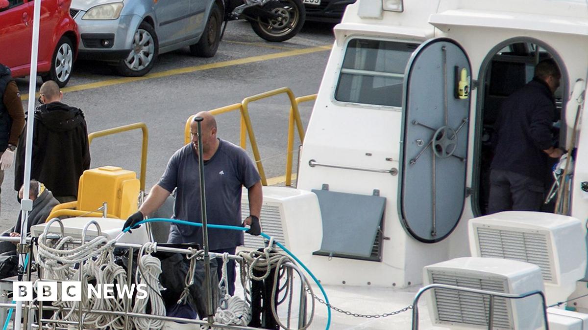 Eight migrants drown after boat tries to escape Greek ship