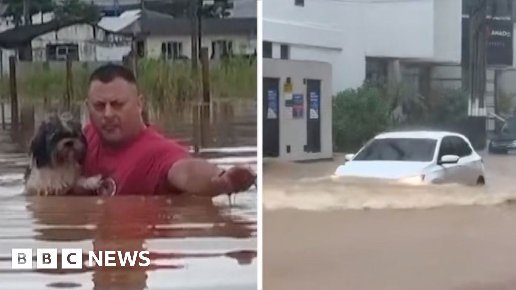 Homes and roads inundated by floodwaters in Brazil