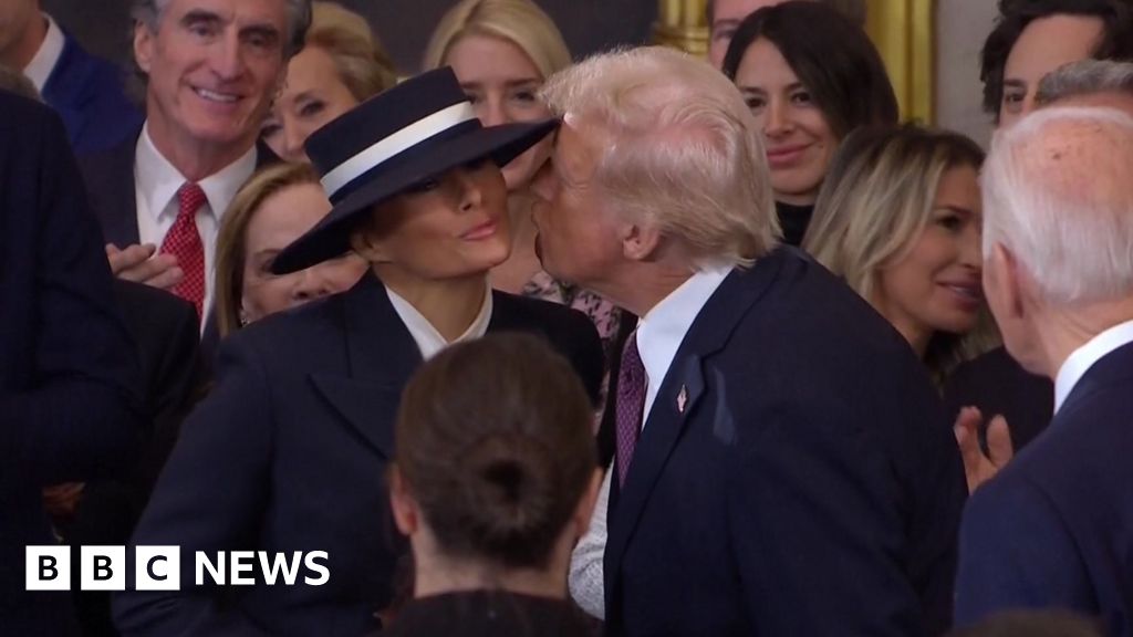 Awkward air kiss as Trump enters Capitol to applause